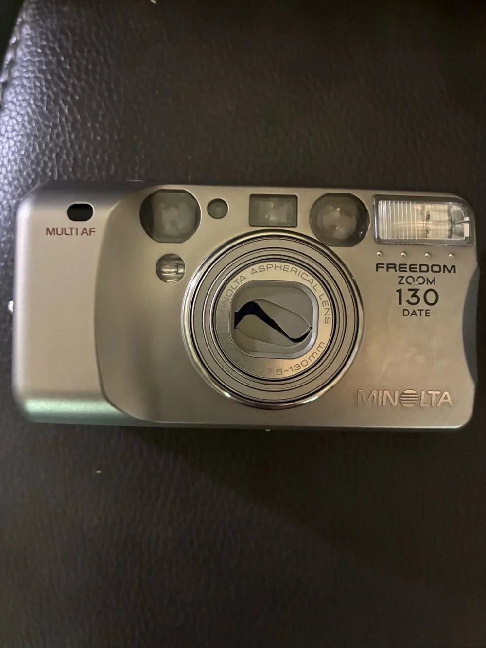 Minolta Freedom 130 Zoom 35mm Film Camera w/Carrying Case, Manual, & Film Roll